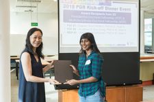 A PhD in Information Systems student receiving the SMU Multidisciplinary Doctoral Fellowship Award in 2018.
