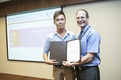 A PhD in Psychology student receiving the SMU Presidential Doctoral Fellowship Award in 2014.